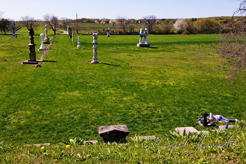 sculptures at the open air museum and visitors