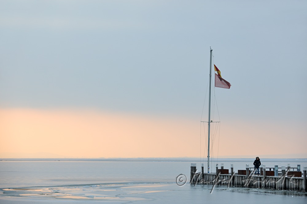 icebound buoys and bicyclist