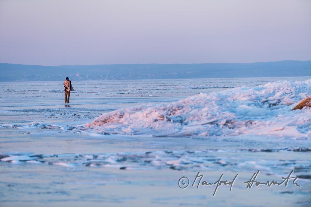 stacked up ice floes near the light house and a rambler